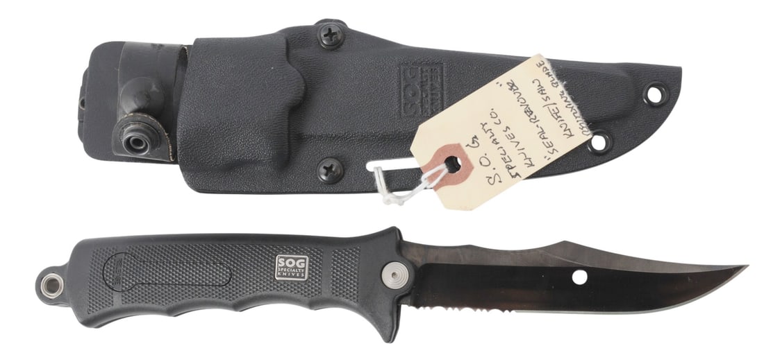 SOG Specialty Knives Seal-Revolver Knife (RM) (RM): A SOG Specialty Knives Seal-Revolver Knife that is in very good like new condition with both a blade and saw combo. Comes with the factory scabbard in very good condition.