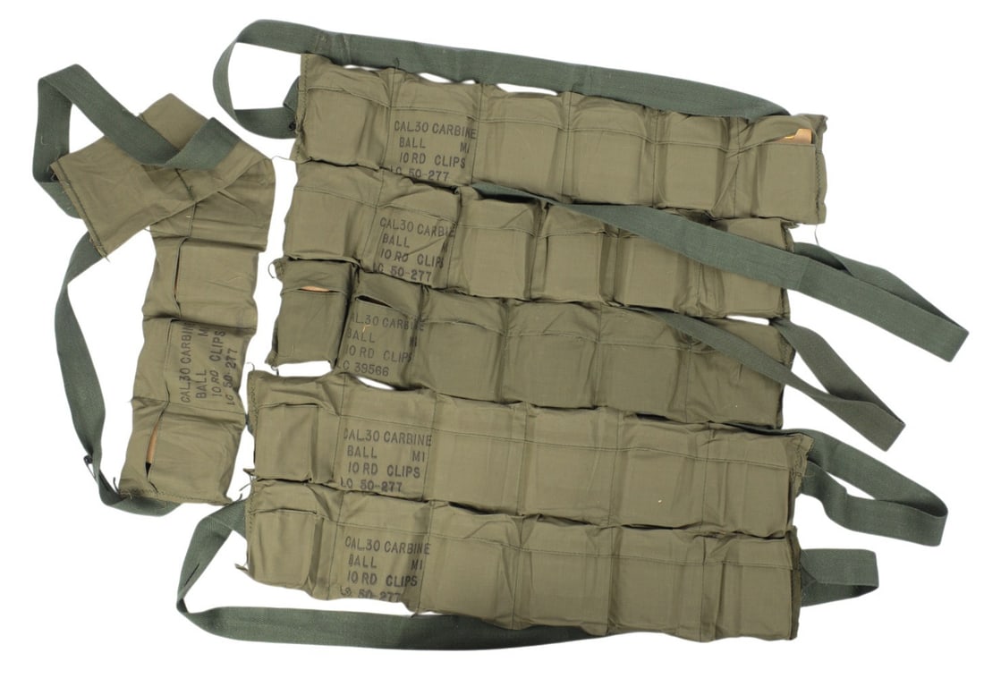 US Military Surplus 30 Carbine Bandolier Lot of 660 Rds. on Stripper Clips (RLR): A US Military Surplus 30 Carbine Bandolier Lot of 660 Rds. on Stripper Clips in good to very good condition.