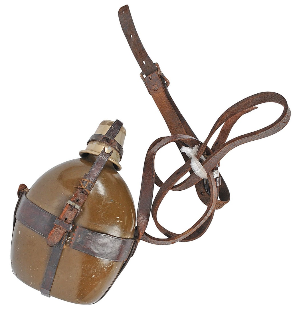 Imperial Japanese Military WWII Canteen, Cup & Harness (A): An Imperial Japanese Military WWII era Canteen, Cup and leather Harness in good to very good condition.