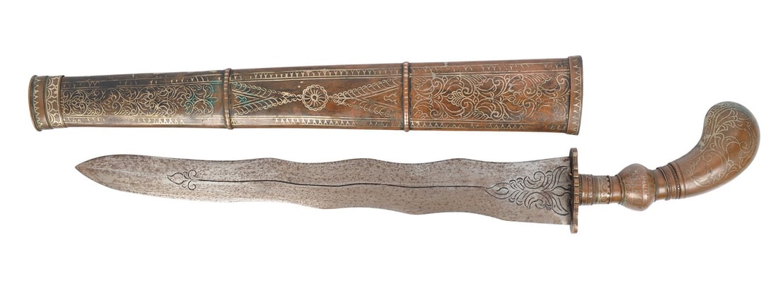 Indonesian/Bali/Javanese Kris Knife (AIF): A nice Indonesian/Bali/Javanese Kris Knife in good to very good condition. Engraved blade and grip with a very ornate scabbard. The bolo was widely used throughout the islands as a practical