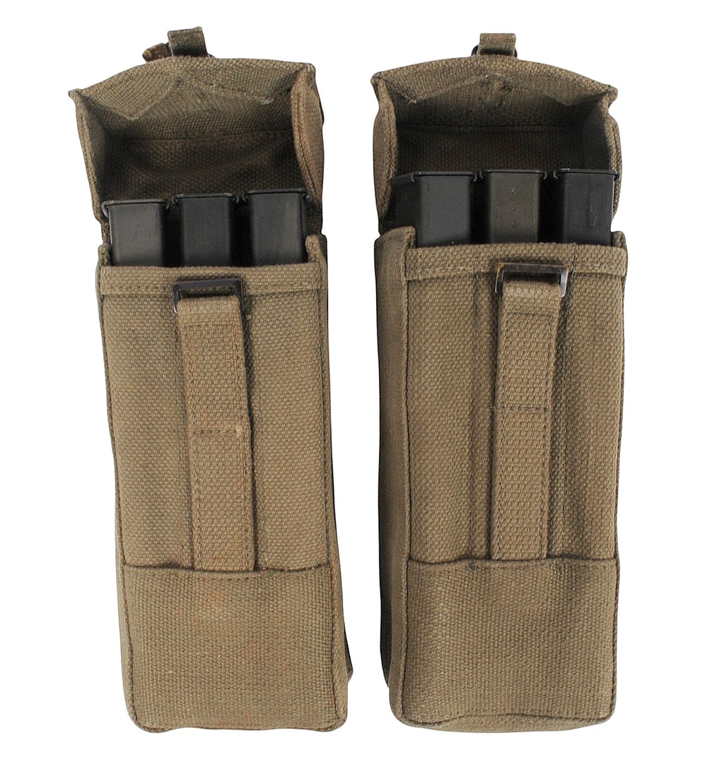 Israeli UZI 9mm 32 Rd. Magazine Lot of 6 with Mag Pouch Lot of 2(SDJ): An Israeli UZI 9mm 32 Rd. Magazine Lot of 6 with Mag Pouch Lot of 2 in good to very good condition.