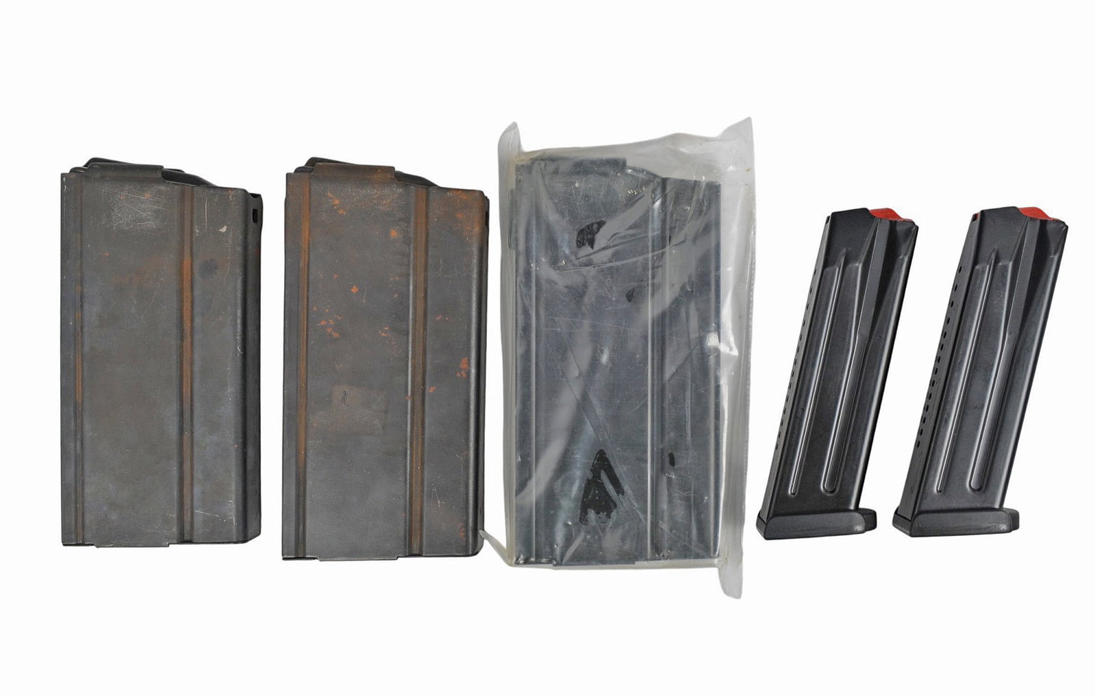 USGI Surplus M14 7.62x51mm 20 Rd. Magazine Lot of 3 with HK VP9 9mm 17 Rd. Magazine Lot of 2 (EDN): A USGI Surplus M14 7.62x51mm 20 Rd. Magazine Lot of 3 with HK VP9 9mm 17 Rd. Magazine Lot of 2 in good condition.