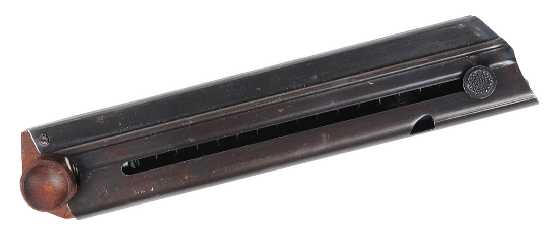 WW1 Era P08 Luger Magazine (HJJ): A WW1 Era P08 Luger Magazine with a correct wooden baseplate. It's in good condition with minor usage wear.