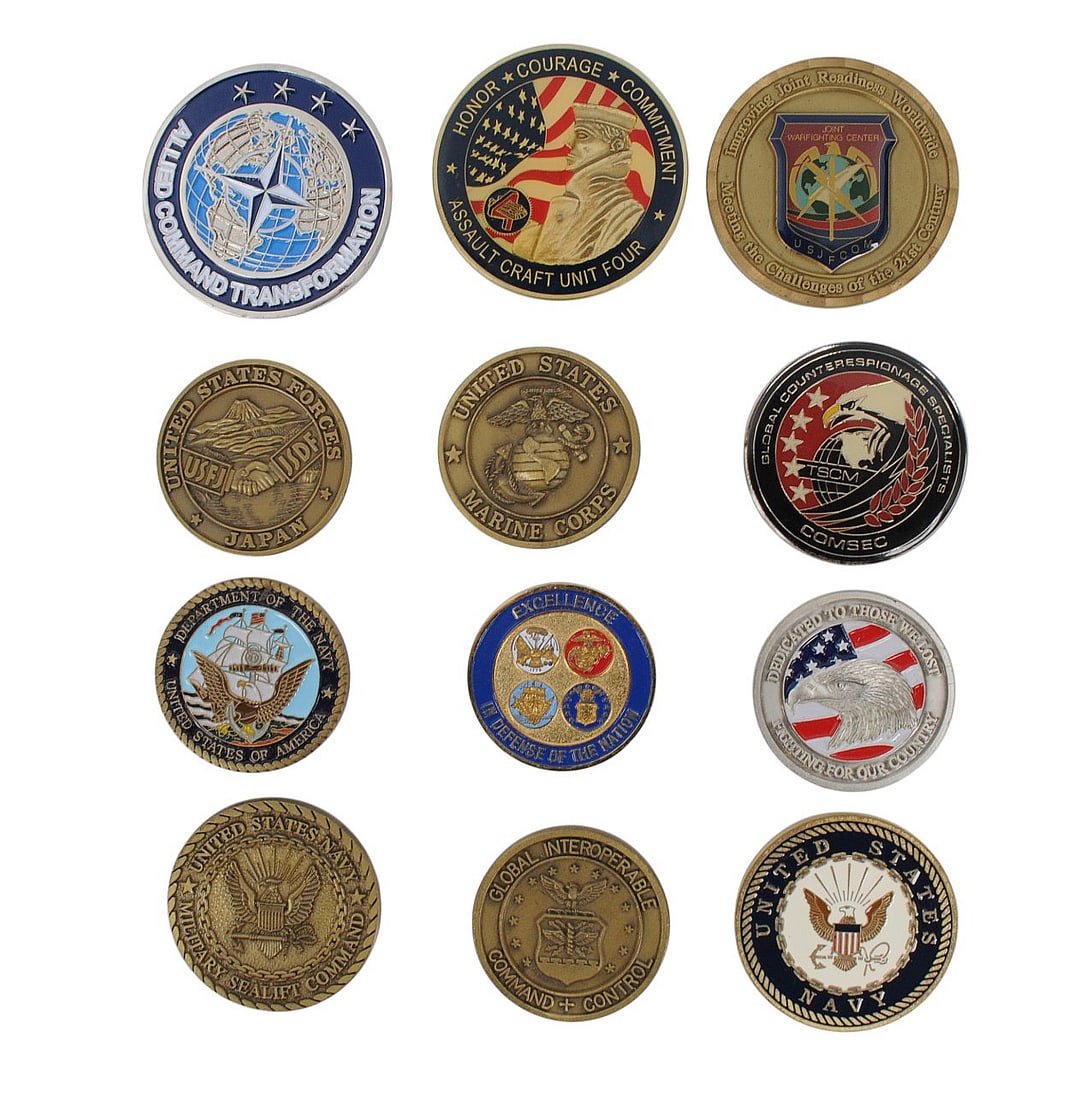 US Navy, Marine Corp, and Joint Command Challenge Coin Lot of 12 (EDN): A US Navy, Marine Corp, and Joint Command Challenge Coin Lot of 12 in good to very good condition. This lot includes coins from NATO, ACU 4, USJFCOM, Joint USFJ/JSDF, Marine Corp, TSCM COMSEC,