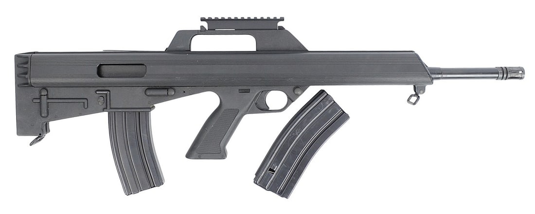 Bushmaster M17S 5.56x45mm Semi-auto Bullpup Rifle FFL Required: P03213 (PSG1): A Bushmaster M17S 5.56x45mm Semi-auto Bullpup Rifle that is in good condition with a bright and defined bore. The action appears to function properly, and the finish shows light usage wear with some