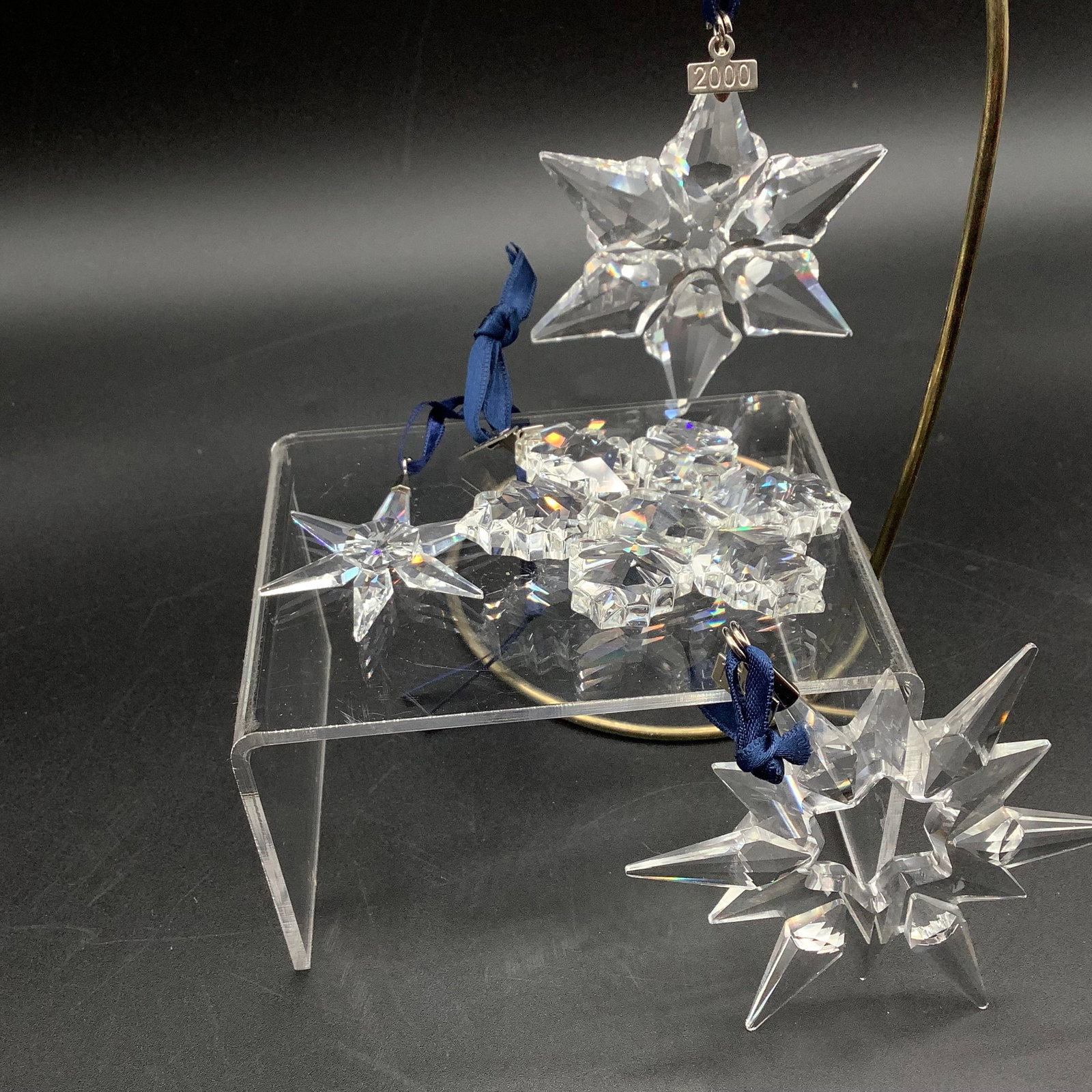 4 Vintage Swarovski Star Snowflake Ornaments: 4 Swarovski Star Snowflakes- see photos for dates.