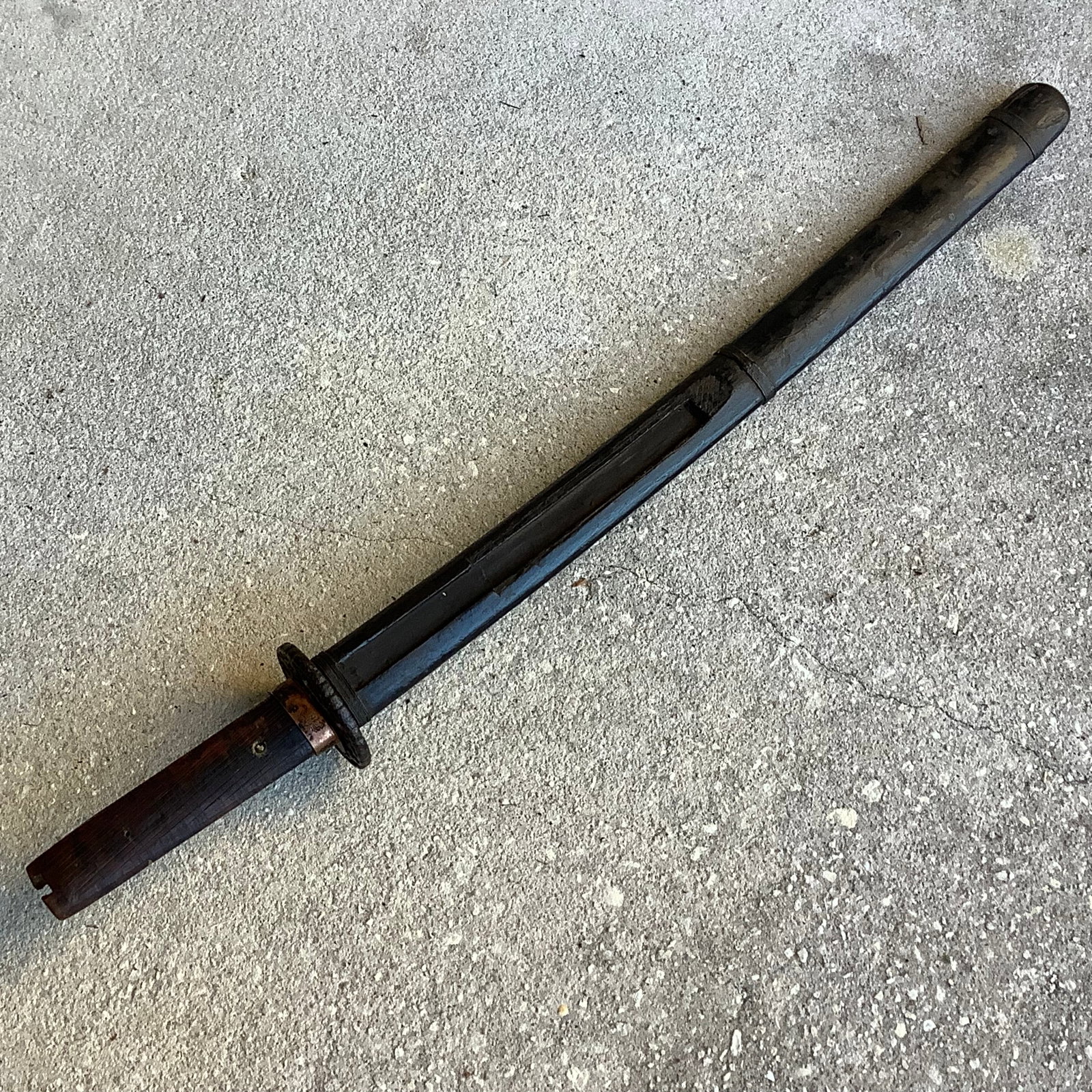 World War II Officers Sword with Wooden Sheath: WW II 24 inch officers sword with wooden sheath.