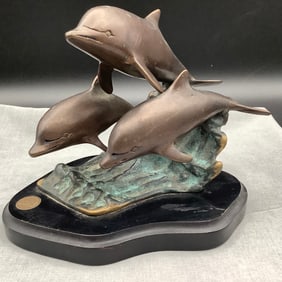SPI, San Pacific International Bronze Dolphins