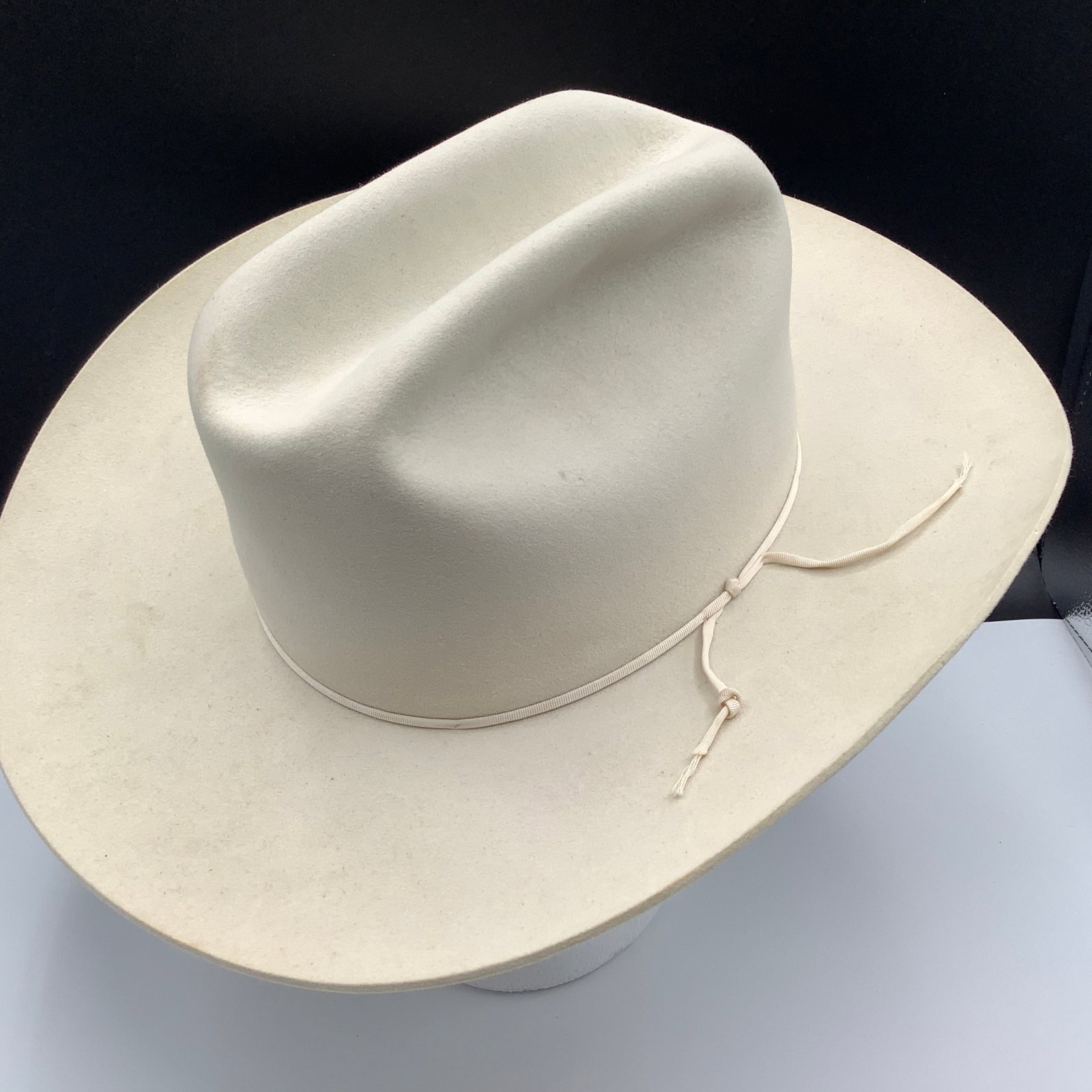 Vintage Hand Creased 3X Beaver Cowboy Hat from Julius Lewis Store, Memphis: Inner band marks: Julius Lewis Memphis Tenn Conforeze leather, 3X Beaver Hand Creased, hand written WM Revord Size: measures with tailor's tape 22 inches inside which equates to size 7 US.