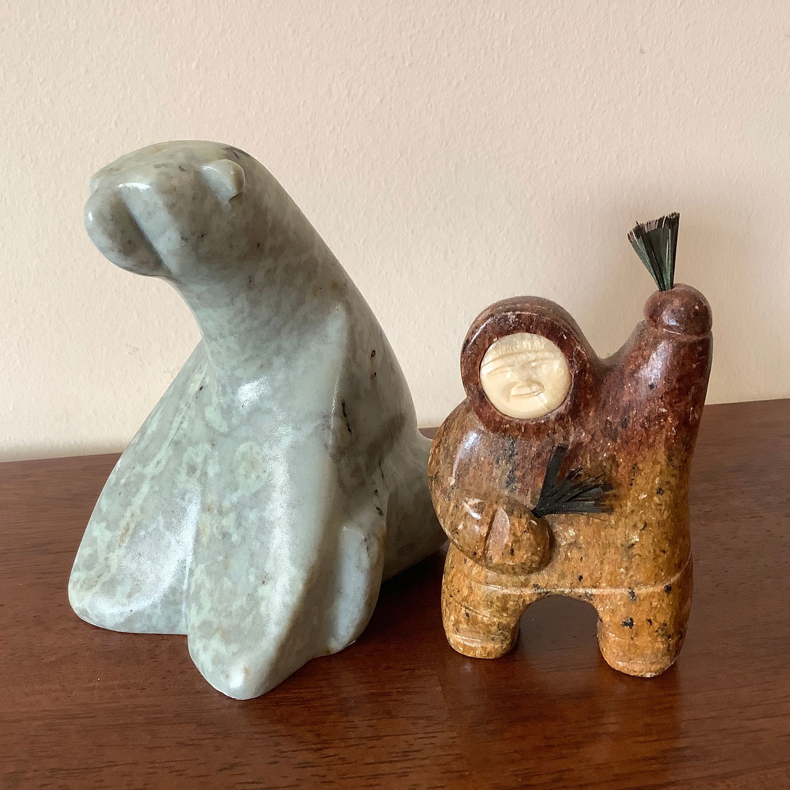 Carved Soapstone Eskimo, Signed Levi Tetpon and Polar Bear signed E.T III: Alaskan Native American Soapstone Carving signed Levi Tetpon(Yup'ik) Soapstone polar bear signed E.T III (Eric Tepton III) The Teptons are a renowned family of carvers from Shaktoolik, Alaska with the