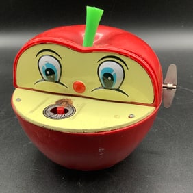 1970s Wind Up Apple Bank with Worm that Pops Out and Grabs Coins