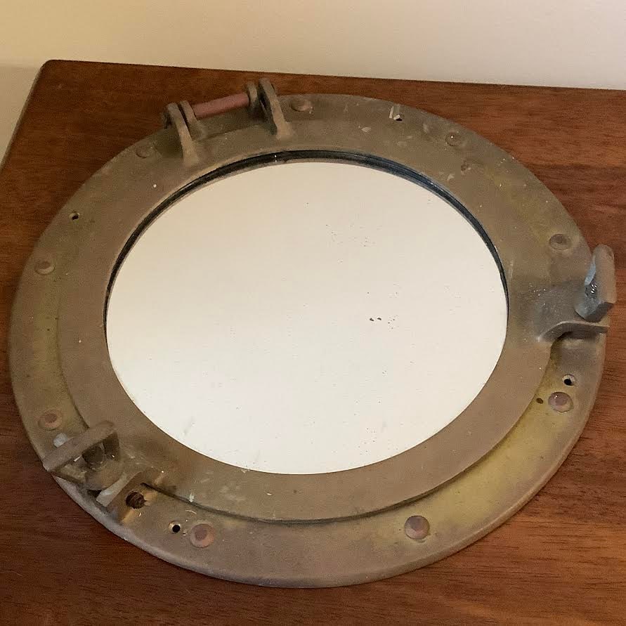 Brass Nautical Porthole Mirror: Brass nautical porthole mirror