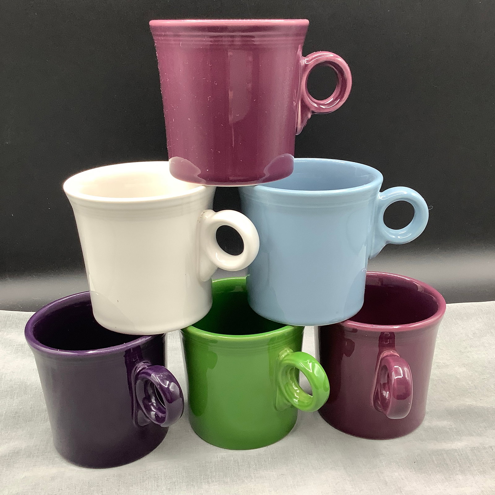6 Fiesta Mugs with Ring Handle: Marked HLC Fiesta USA on underside