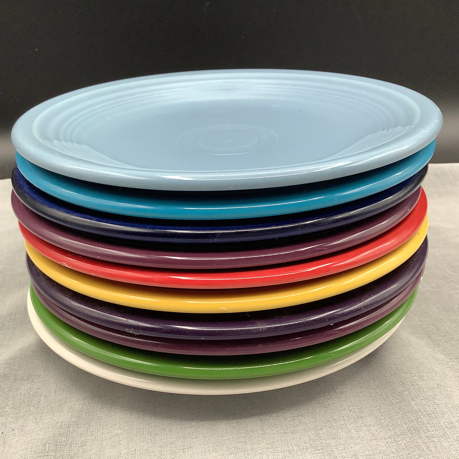 10 Fiesta Salad Plates: Marked Homer Laughlin China Co, Fiesta 7.25 inch size Pre-loved and some scratches evident