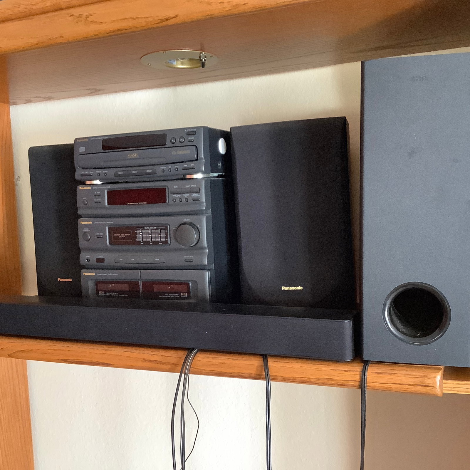 Panasonic Stacked Stereo System with onn Subwoofer and Soundbar: Panasonic stereo stack Double cassette deck, Integrated Amplifier with EQ, Synthesizer tuner, CD changer, Speakers Also includes onn wireless subwoofer and Atmos soundbar