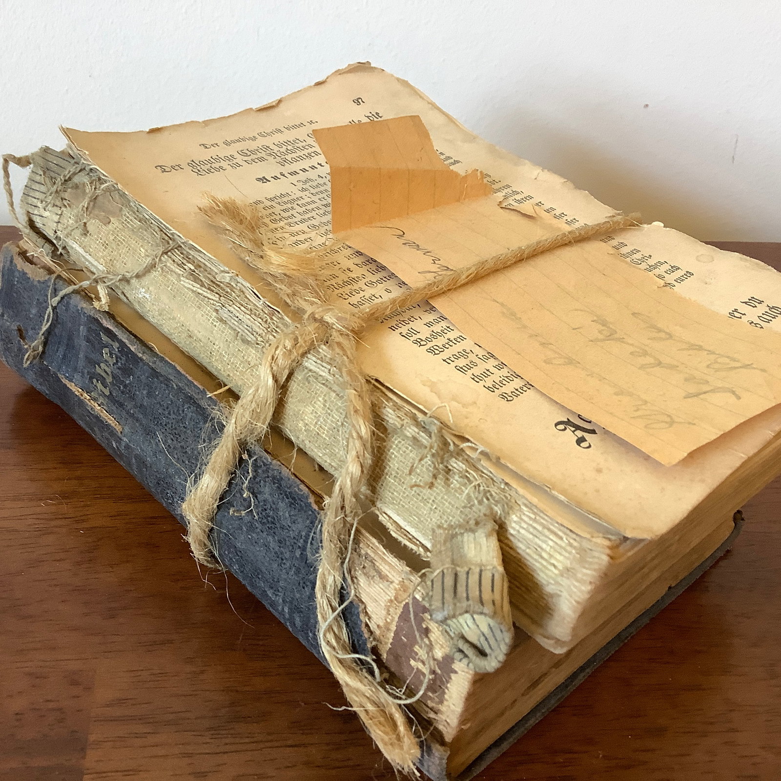 Pair of Antique German bibles, Die Bibel: Books in German and tied together with twine Auctioneer did not open and examine- as found