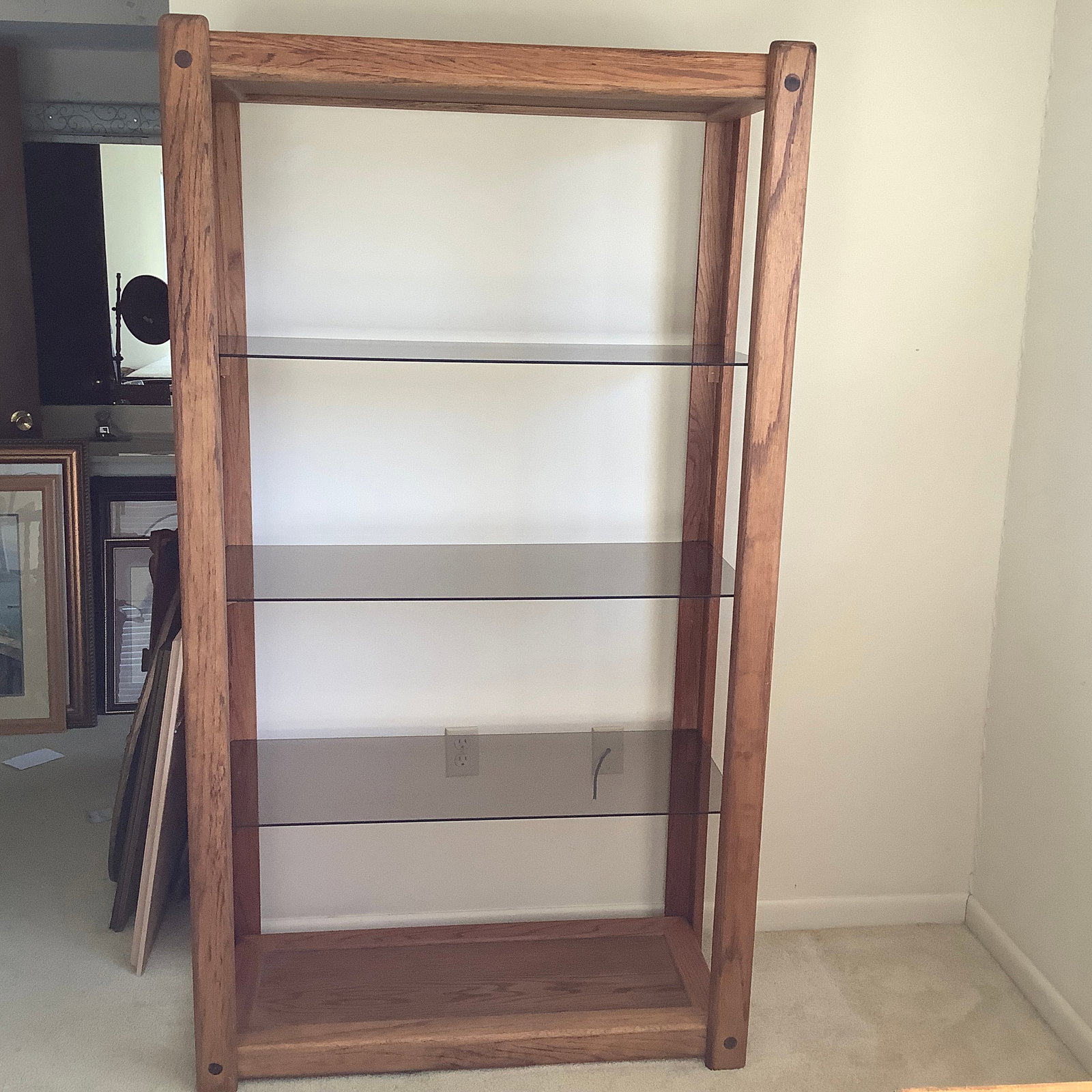 MCM Curio or Book Shelf: Top, base and corner posts wood 3 shelves smoke tint glass that appear to be floating Can be taken apart for transport.