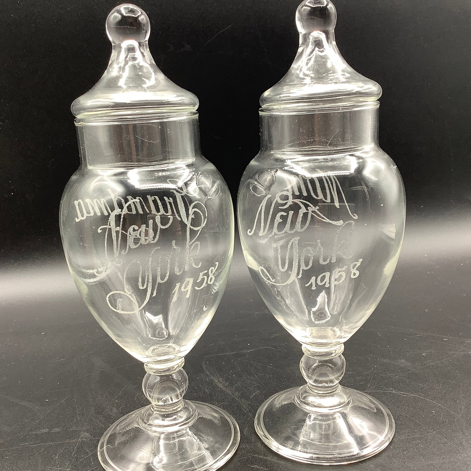 Pair of Apothecary Jars from 1958: Jars are Etched in script New York 1958 with Granma on one jar and Mom on the other Both have lids with ball top