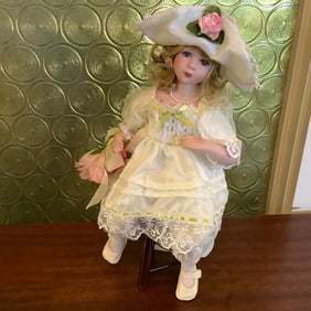 Vintage Doll Sitting in Chair