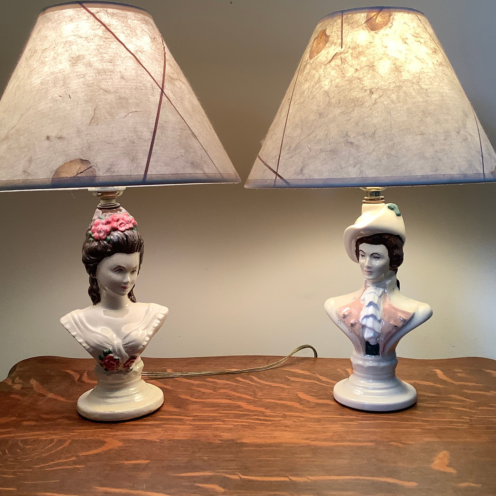 Pair of Vintage Porcelain Victorian Bust Boudoir Lamps: Hand painted male and female busts Shades included but not original