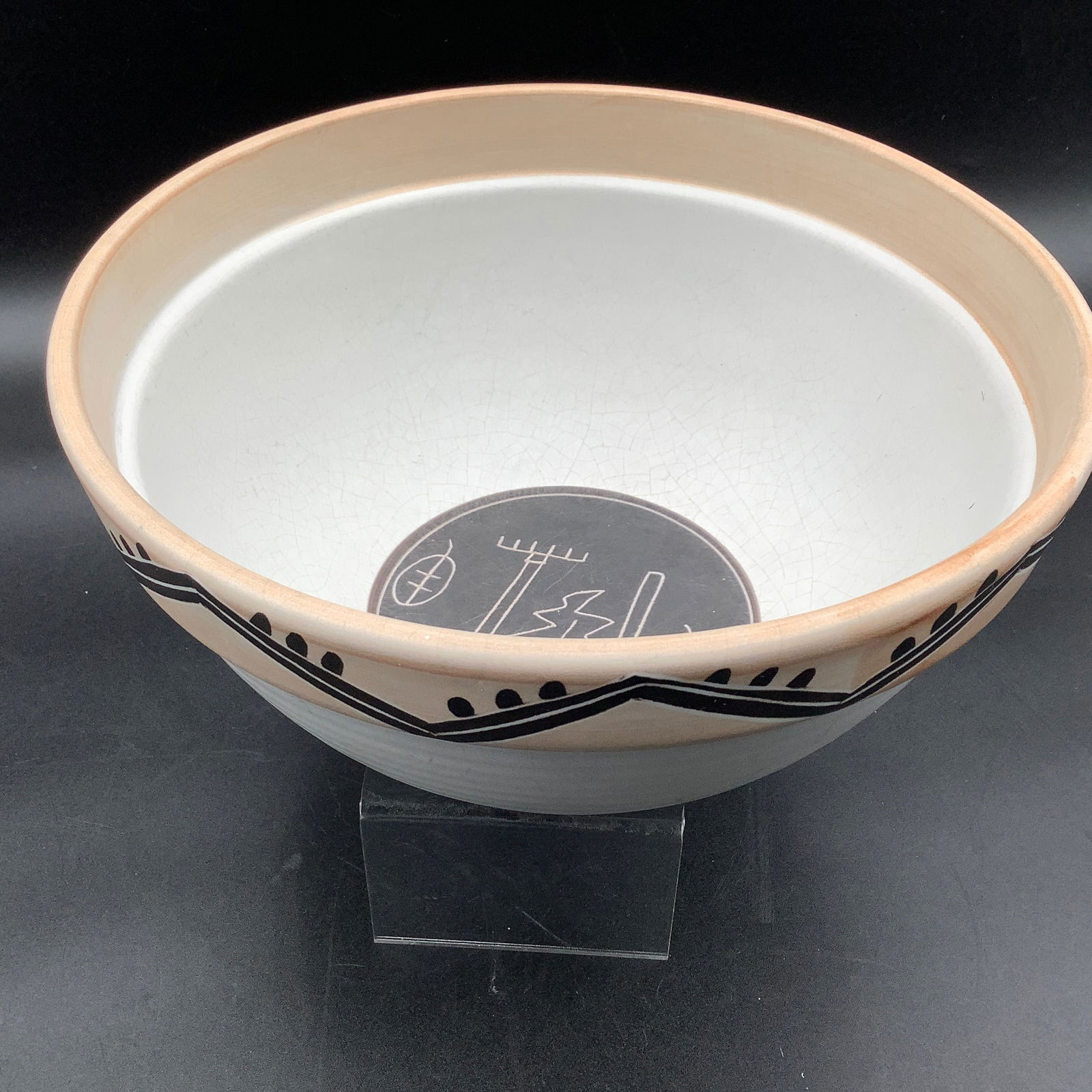 Treasure Craft Pottery Bowl w/ Stick Drawing Inside, Southwestern Exterior: Pottery stoneware bowl with ribbed exterior Fall stick drawings on bottom of interior Some crazing