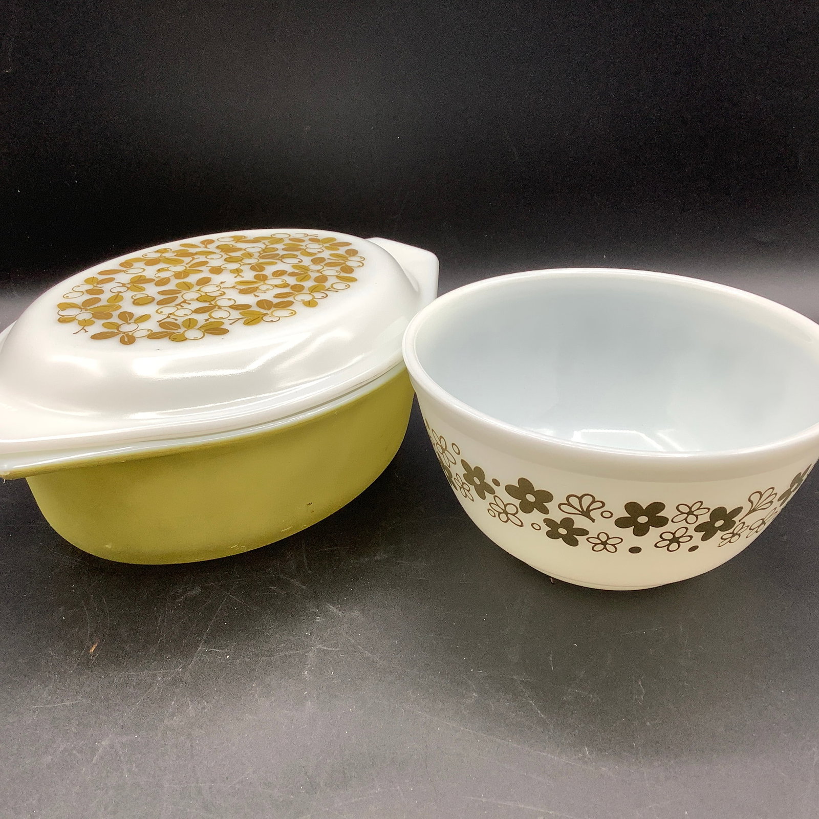 Pyrex Crazy Daisy White with Green & Verde Olive Casserole with Lid: Crazy Daisy in 1 1/2 qt, #402 Pyrex verde olive pattern in avocado Casserole bottom has color loss due to age/wear