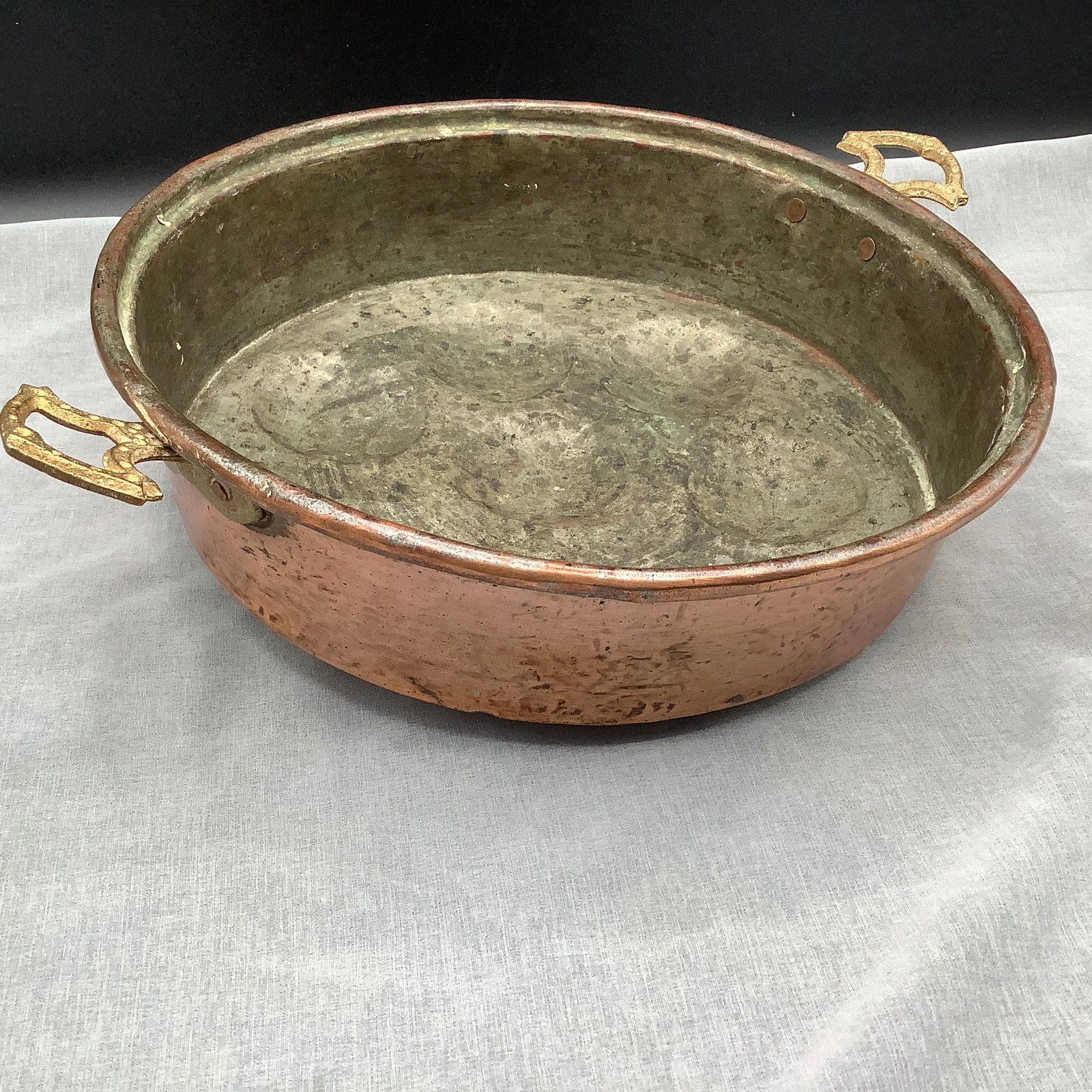 Antique Copper Egg Pan with Brass Handles: Antique copper egg pan with brass handles
