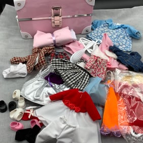 Small Box Filled With Doll Clothes