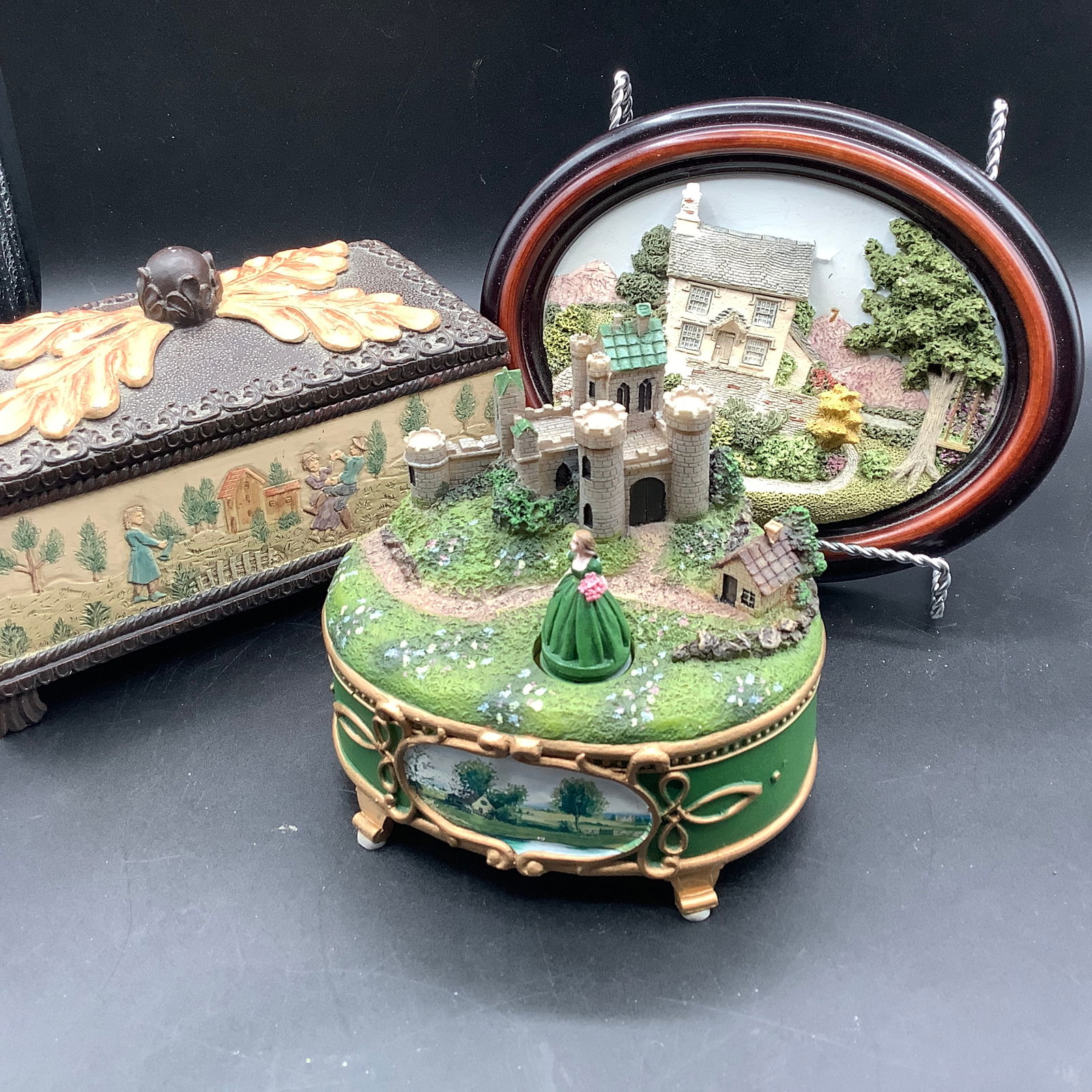 Dimensional Art Grouping: Relief Art, Jewelry Box and Music Box: Handcrafted in Cumbria, UK Signed PA McHugh, Quayside Partnership 3D Relief of Pooley Bridge, 1999 Irish Countryside music box 2010 witih twirling girl in front of castle Jewelry box with Folk Art dan