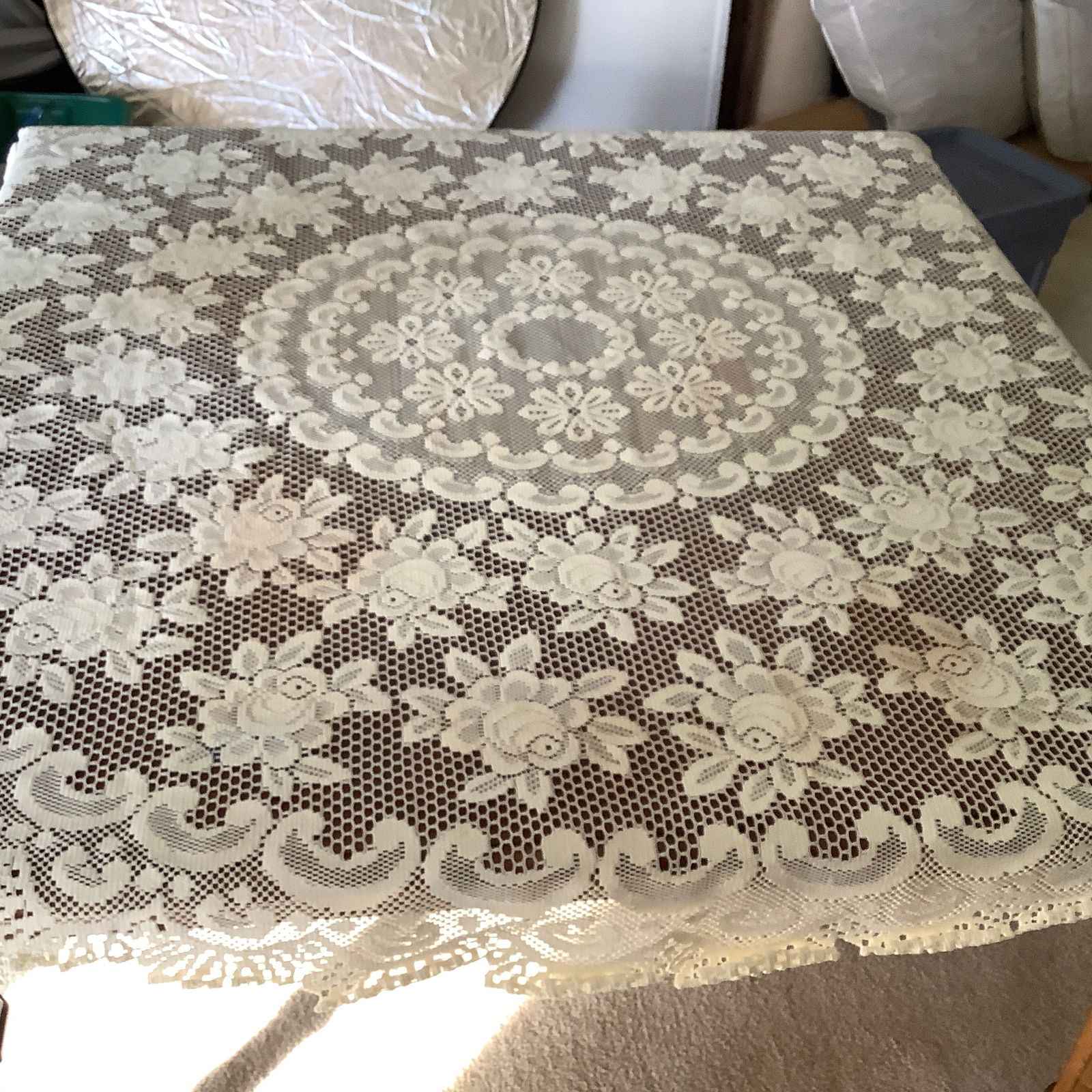 Vintage Lace Tablecloth, Oval 64 x 70: Stain as shown on one flower. Estate item, no attempt to clean