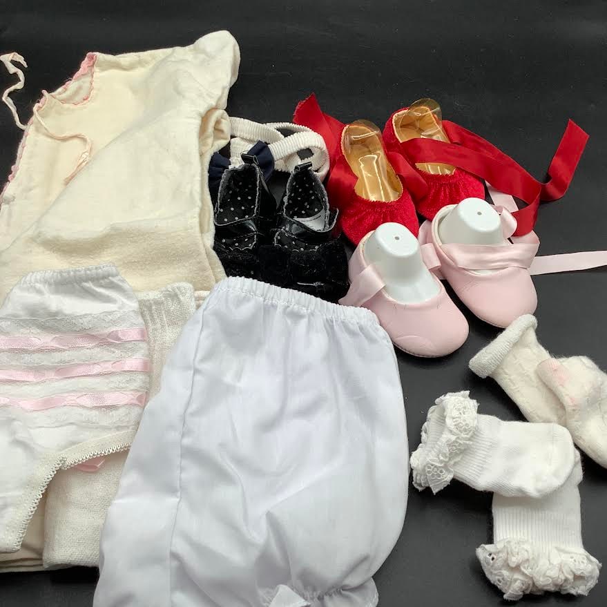 Baby Girl Clothes and Shoes: 3 Pairs of baby shoes, socks, diaper covers, one vintage dress with pink trim, perfect doll clothes.
