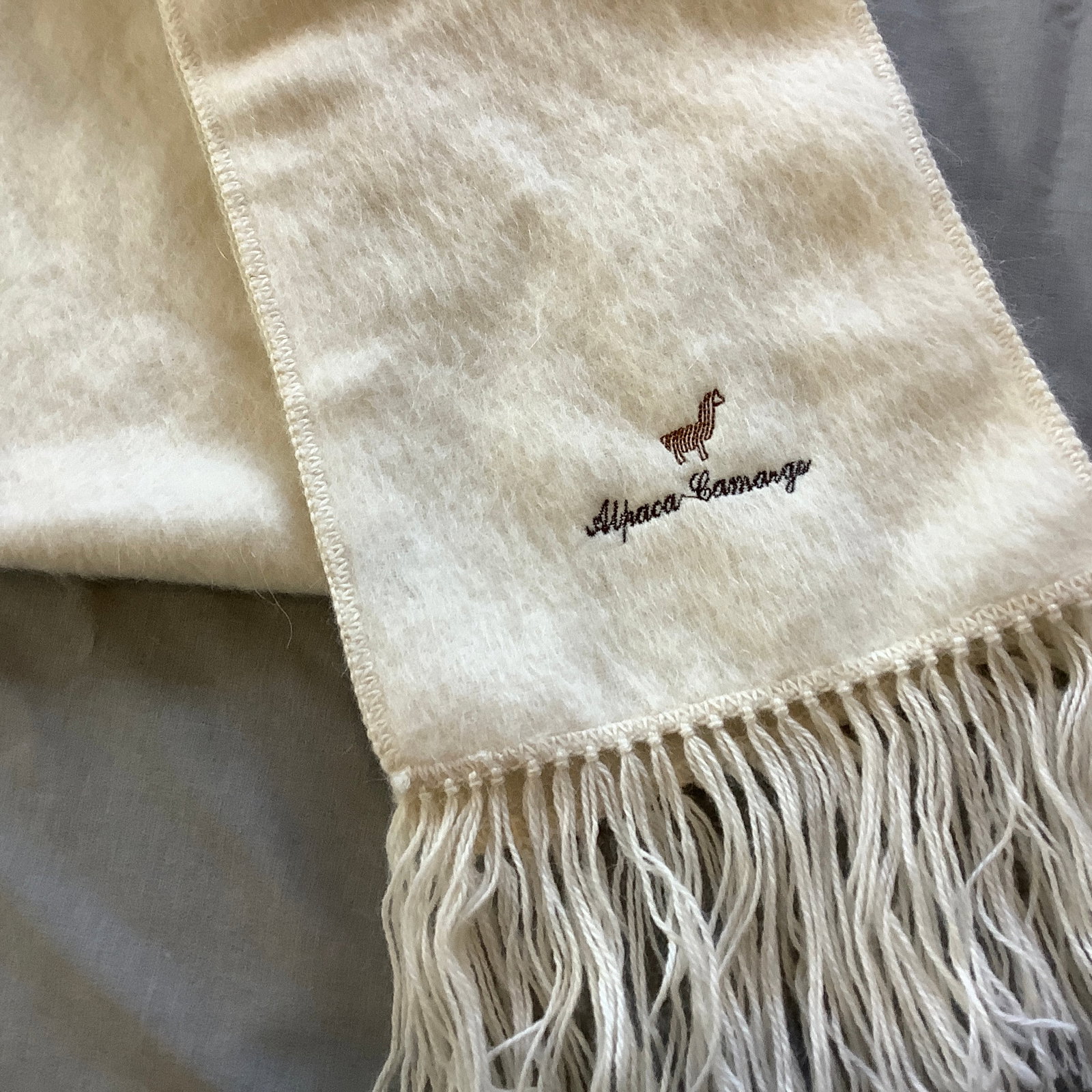 Alpaca-Camargo Peruvian Wool Fringed Scarf: Cream color 9 inch wide x 64 inch long plus 4.5 inches of fringe on both sides Excellent condition-no stains or tears or pulls