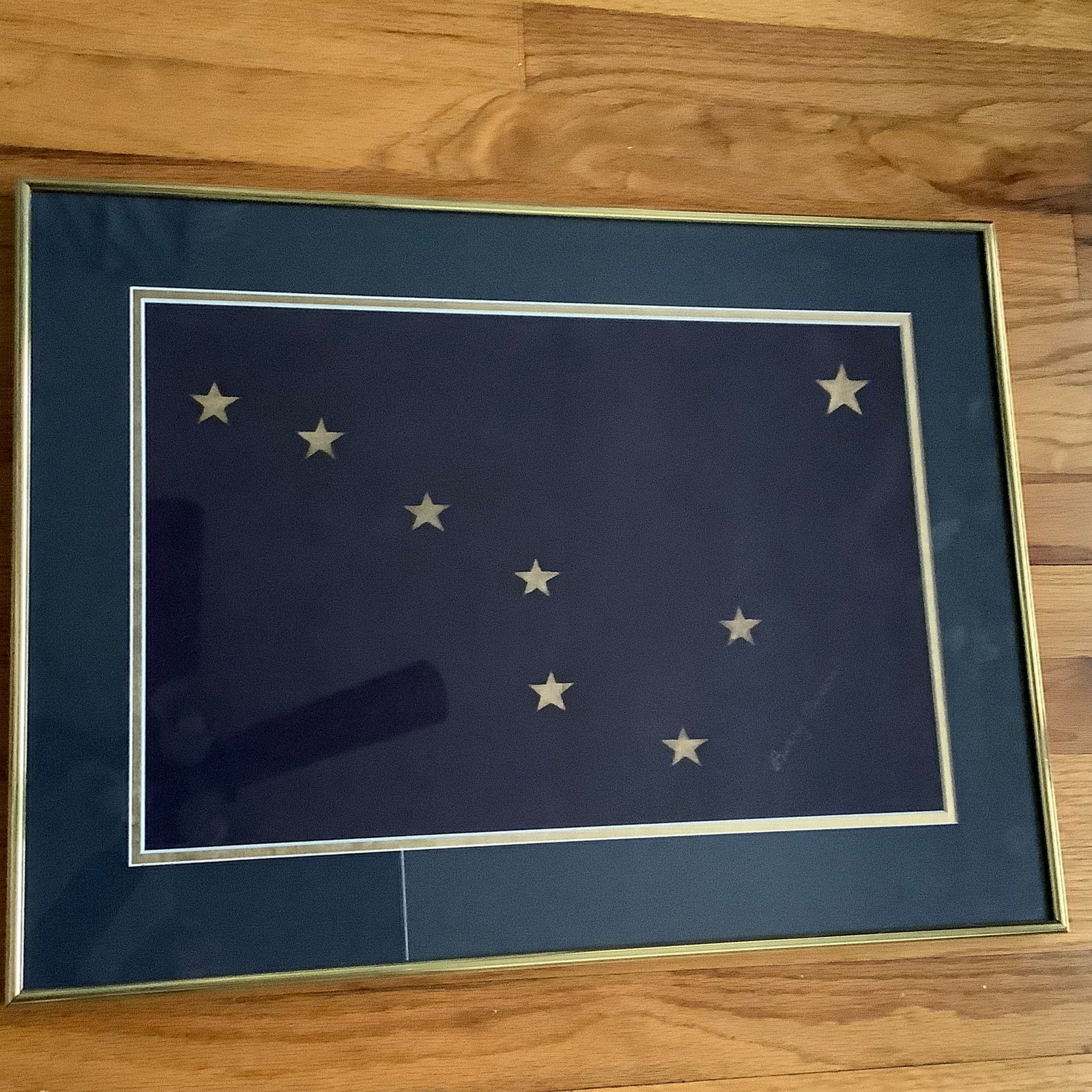 Benny Benson Hand Signed Real Alaska Flag, Framed: In 1927 Benny Benson as a teenager won a contest to design the Alaska flag This is a framed real flag designed by Benny Benson and hand signed Framed 12 x 18 Inspected outside of frame as shown