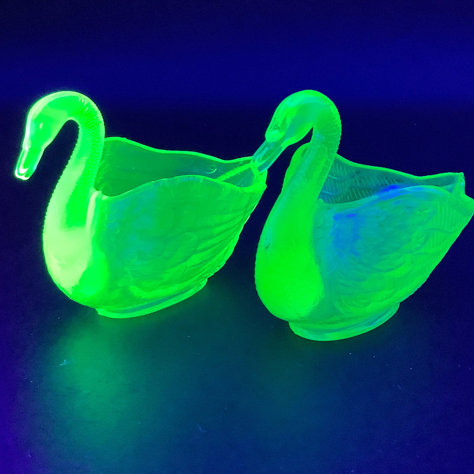 Pair of Fenton Swan Open Salts, Uranium Glass: Detailed textures, green in natural light, glows bright under black light