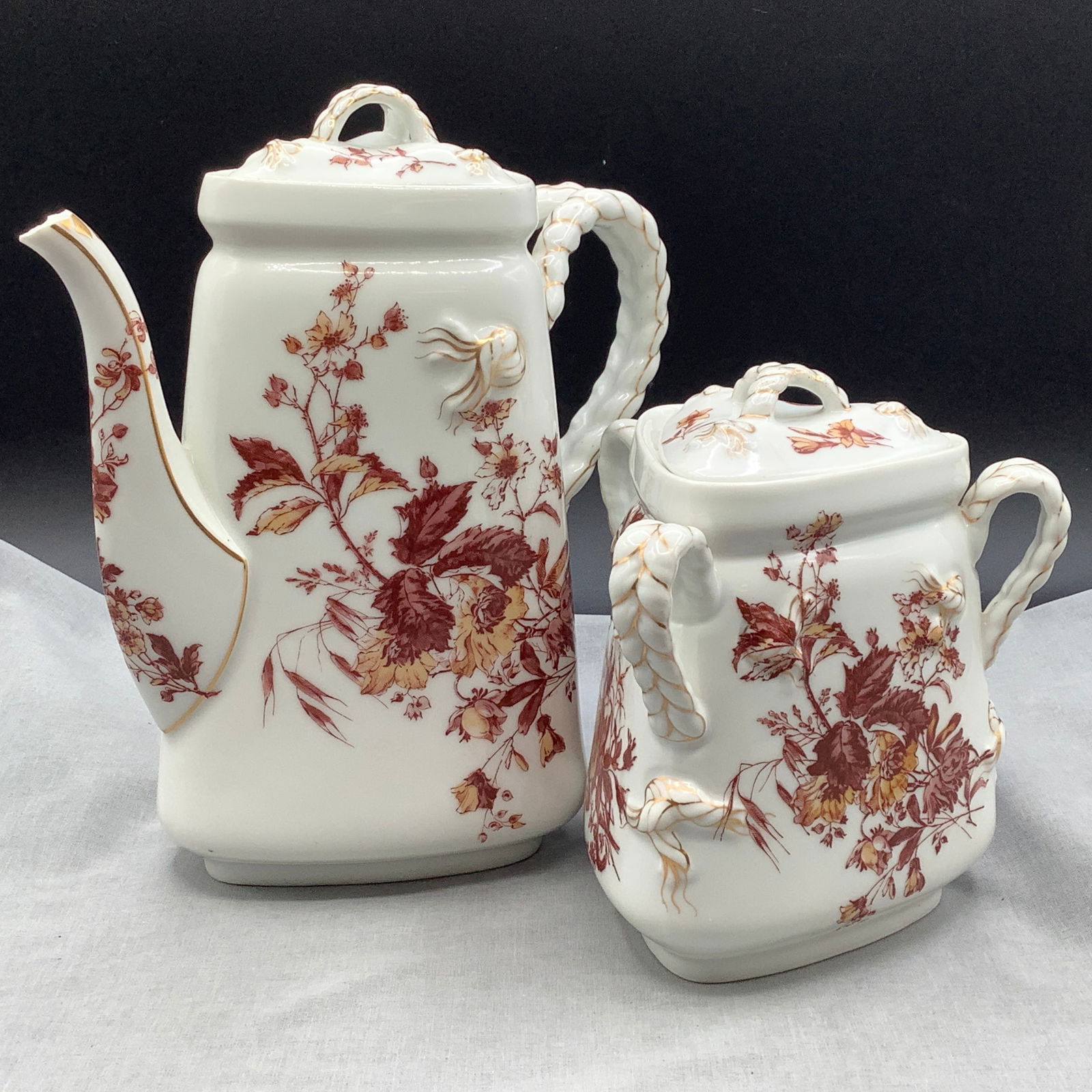 1879 Haviland Limoges Coffee Pot and Sugar: These have the old English Registry Markings that shows these are from 1879-almost 150 years old Nautical rope pattern with hand painted flowers and gold accents. Made in France with full hallmarks bo