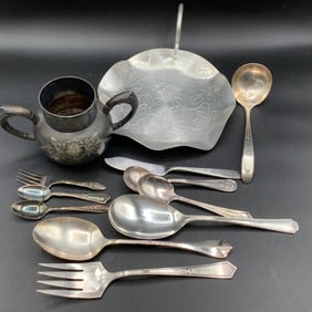 Lot of Silver plate including flatware, toddler utensils, and handled sugar bowl