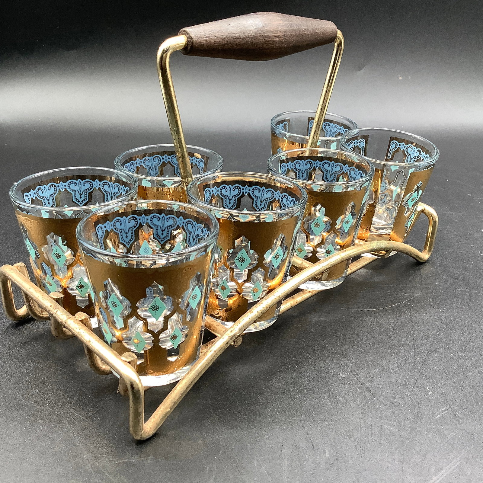 MCM Culver LTD, Shot Glass Set with Caddy: Culver gold pattern, Caddy has teak handle.We can ship in house USPS or use Liveshipping- contact us for quote.