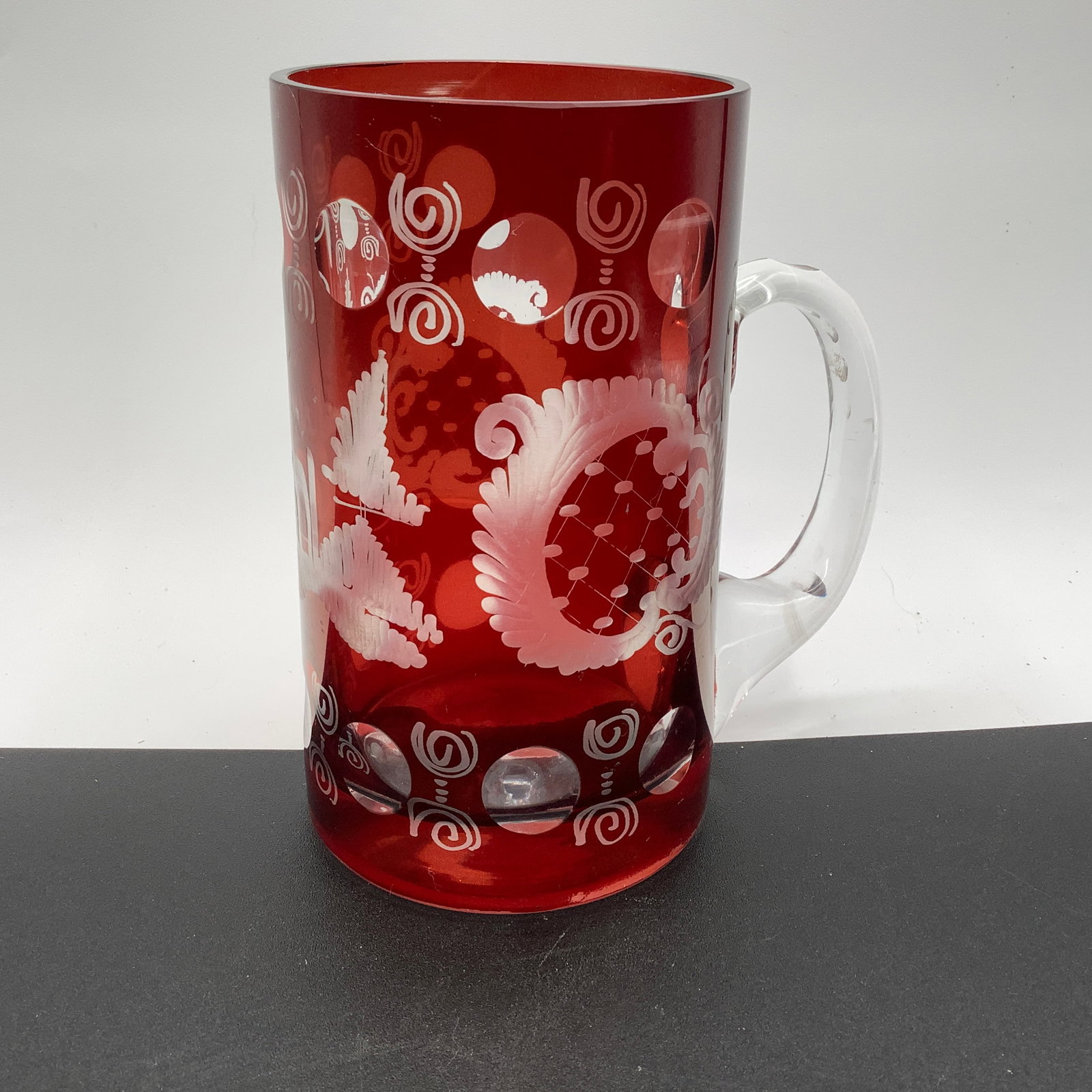 Bohemian Ruby Cut to Clear Mug: Clear handle, dots around top edge alternating with swirls along with traditional motifs