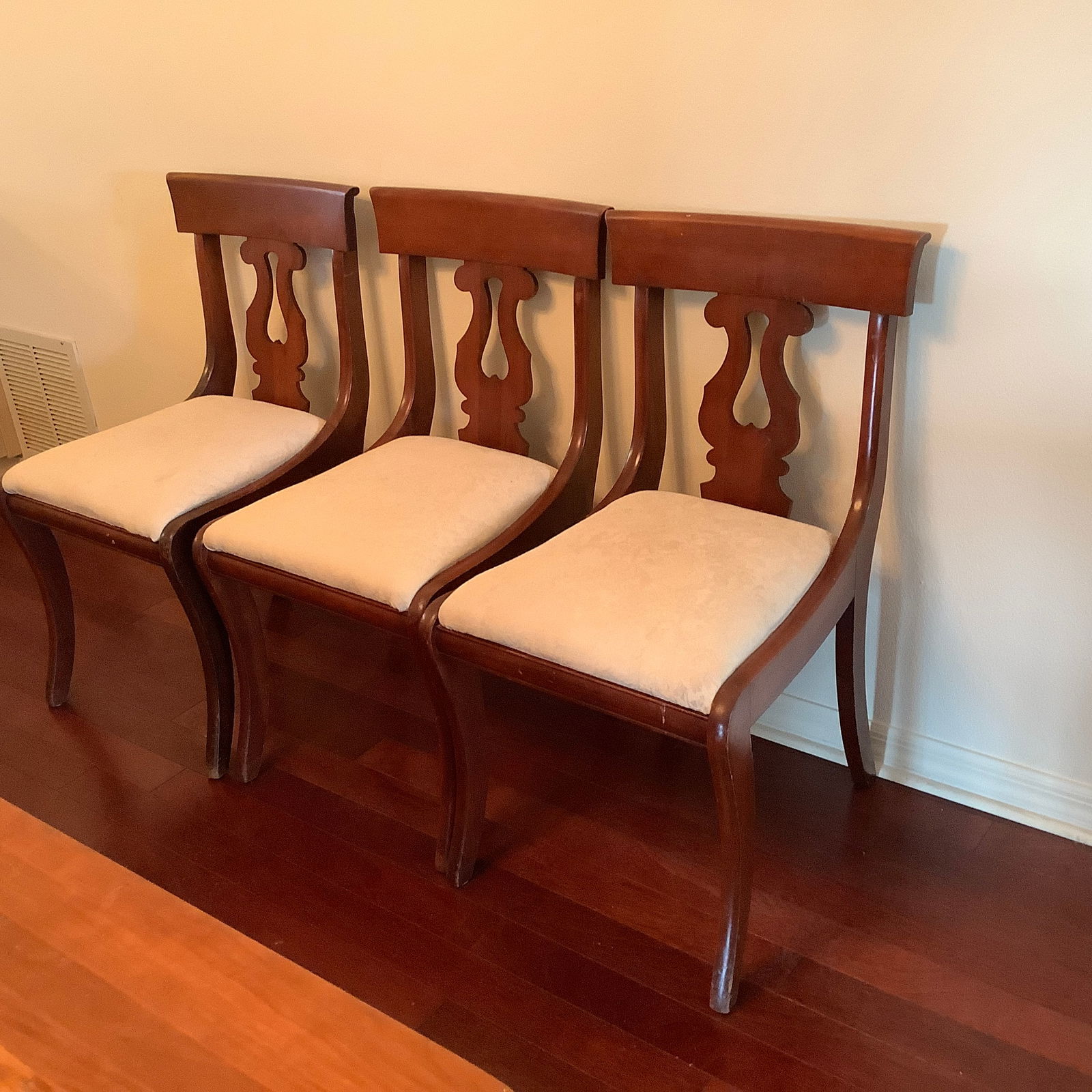 Vintage Mahogany Lyre Chairs Set of Six: Mahogany Set of 6 Lyre Back Chairs Cream colored upholstered seat Maker mark on underside of one chair Some staining (did not try to remove) on seats and minor scratches on wood.