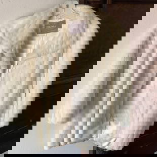 Terzako White Fur Coat: Satin lined, hand made by Terzako Furs in East Orange, NJ Creamy white color. Estate fur, inspected for any damage/stains and found nothing to report. Measurements as best as possible: underside sleev