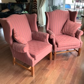 Pair of Wingback Chairs in a light burgundy with muted stripes