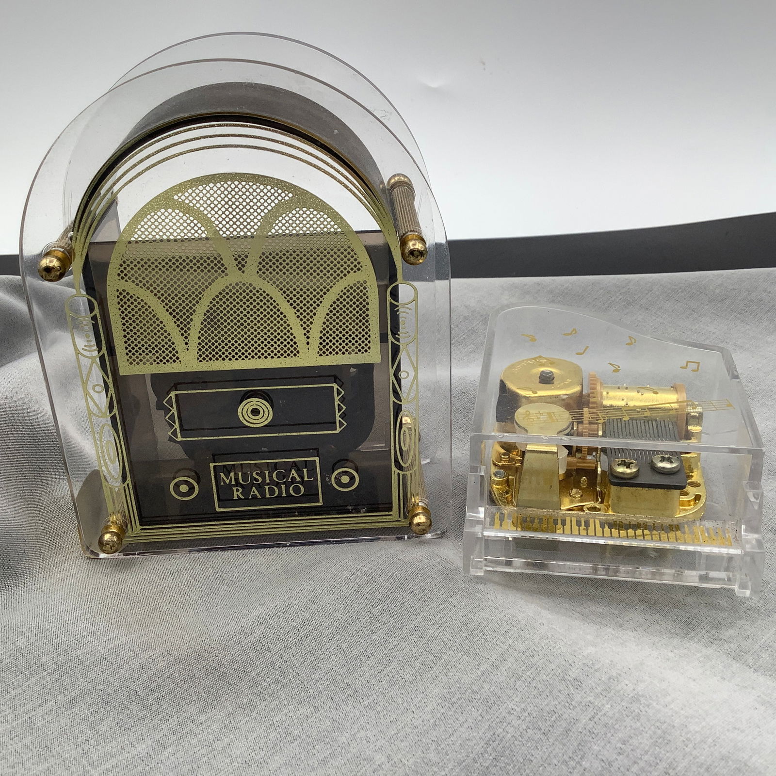 2 Music Boxes, Piano and Vintage Radio: Working, One is a piano, one is a radio.