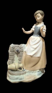 Lladro NAO Girl At Water Fountain #0223: NAO by Lladro glazed porcelain figurine of a girl at a water fountain with a broken water jug. In excellent condition, no chips or cracks. Marked NAO on the bottom. 11 1/2" H x 8" W.