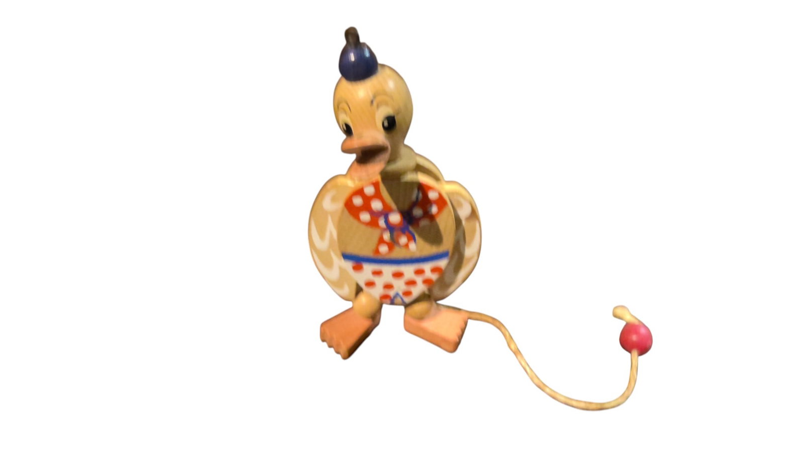 Austrian made vintage flapping duck: Vintage wooden string toy in the form of a flapping duck. Hours of fun, as long as your expectations aren't too high. Vintage wooden pull string duck toy in good condition. Duck flaps its wings when t