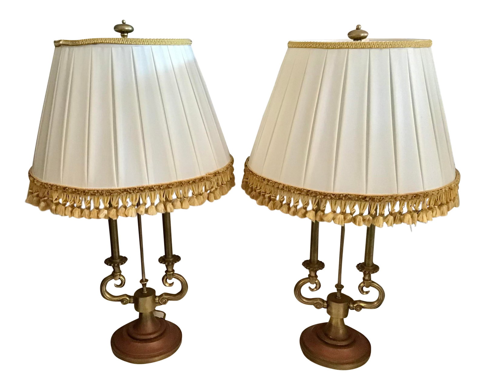 Jansen Metal Table Lamps With Original Jansen Lamp Shades, a Pair: 16.25"W × 16.25"D × 28.5"L Original pair of Jansen Metal Table Samps with the original Jansen shades with gold fringe made in the 1960s. Notice the worn age on the bases add natural warmth to your i