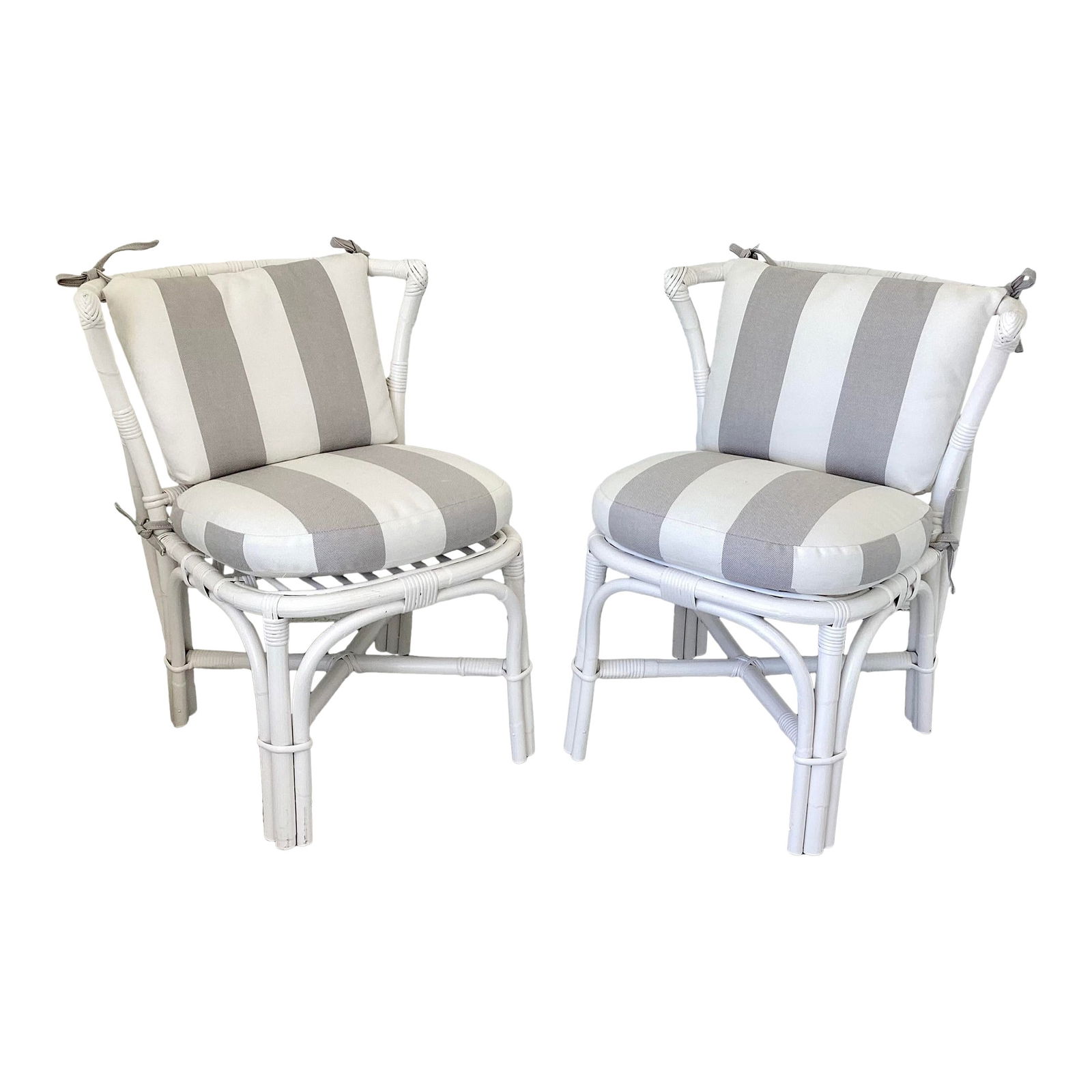 Ficks Reed Curved Back Side Chairs With New Sunberella Upholstery, a Pair: 23.5"W _ 25"D _ 30"H Seat Interior Depth: 15.0 in Seat Height: 20.0 in Seat Interior Width: 18.5 in 1960s pair of Ficks Reed boho chic rattan side chairs with curved backs. New Sunbrella cushions, lac