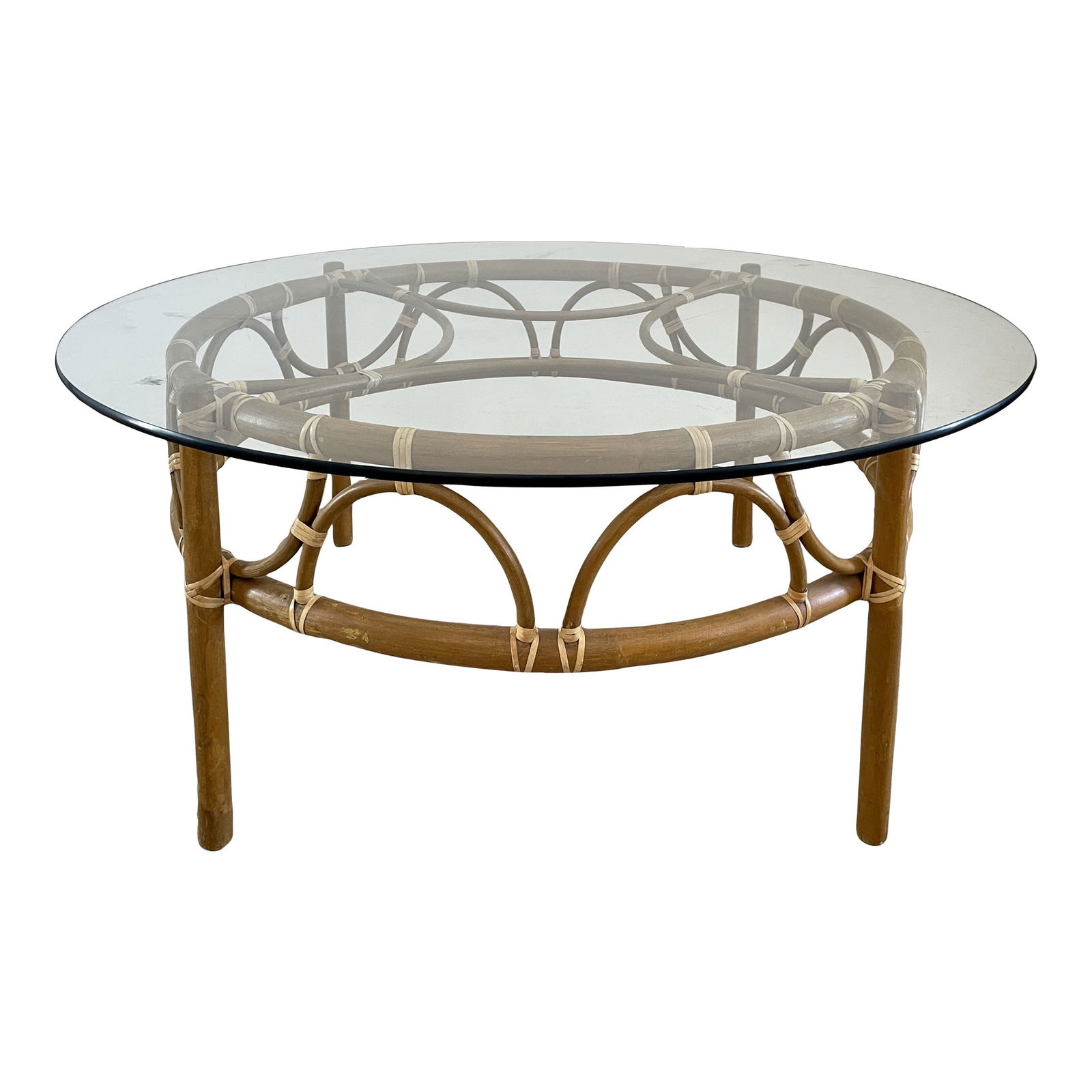 Boho Chic Bamboo Rattan Round Coffee Table: 41.5"W × 41.5"D × 18"H 1970s Boho Chic round natural bamboo rattan coffee table with a round glass top. Great addition to your Boho Chic inspired interiors. Made in U.S.A.