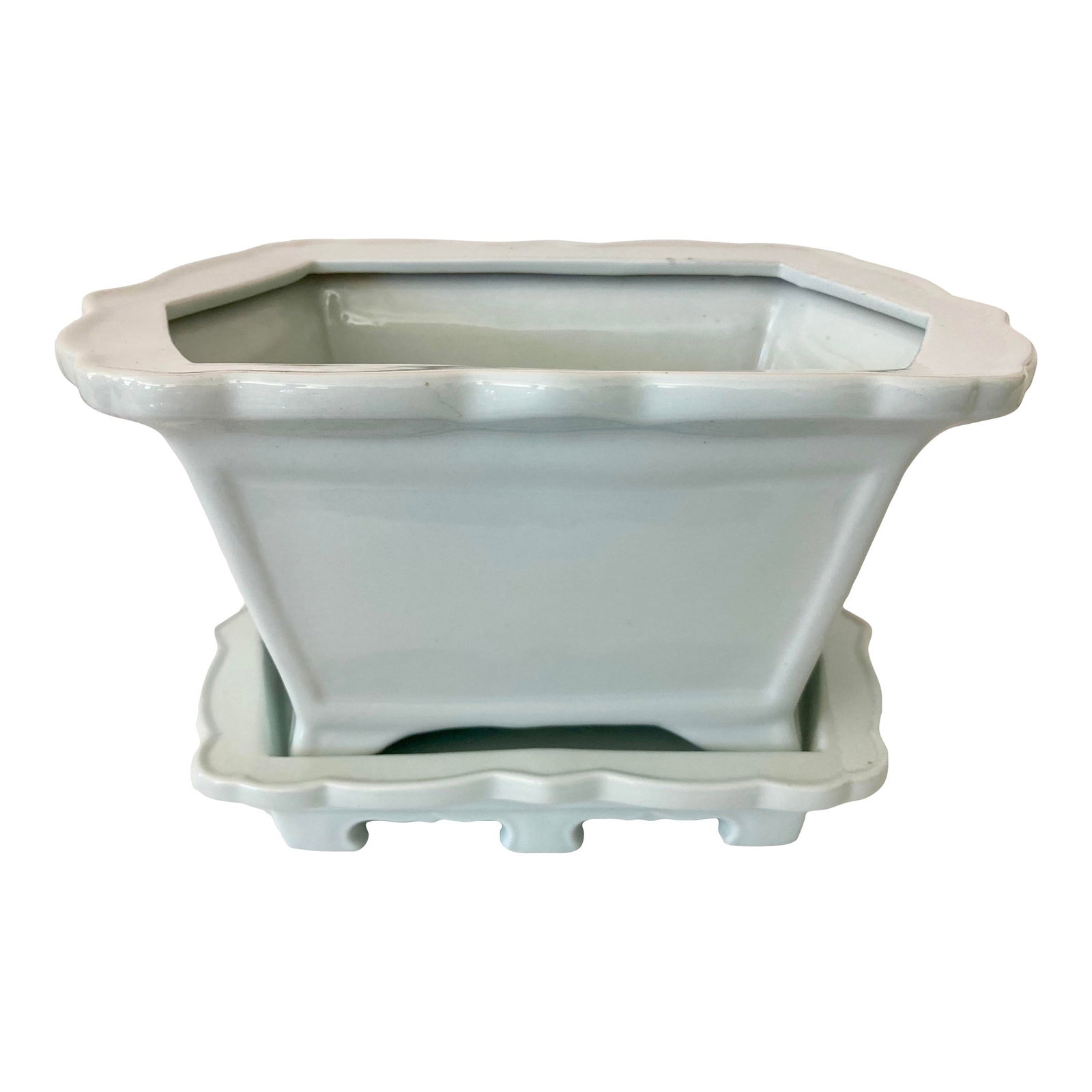 Glazed Chinese Ceramic Cachepot With Lower Water Tray #1 - No Reserve: 18"W × 12"D × 10"H 1950s Chinese glazed off-white ceramic cachepot on a plate with leg stands.