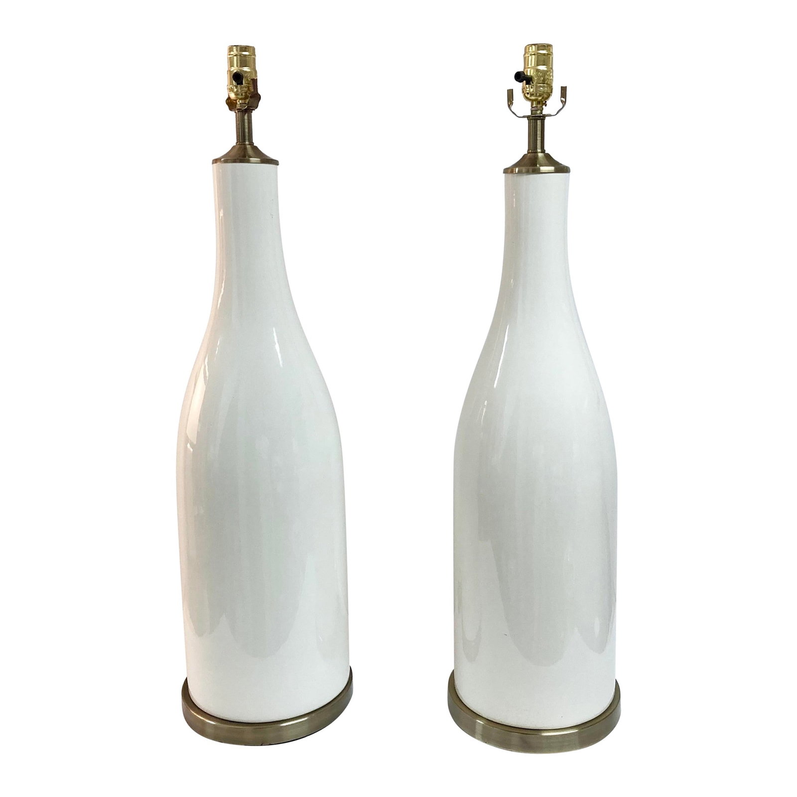 Mid-Century Bottle Shape White Glazed Pottery Table Lamps, a Pair: 8"W × 8"D × 32"L 1960s large scale pair of white glazed ceramic bottle shape Mid-Century table lamps. Nice bronze tone bases set off the large over scale pair of ceramic forms. Just add harps and yo