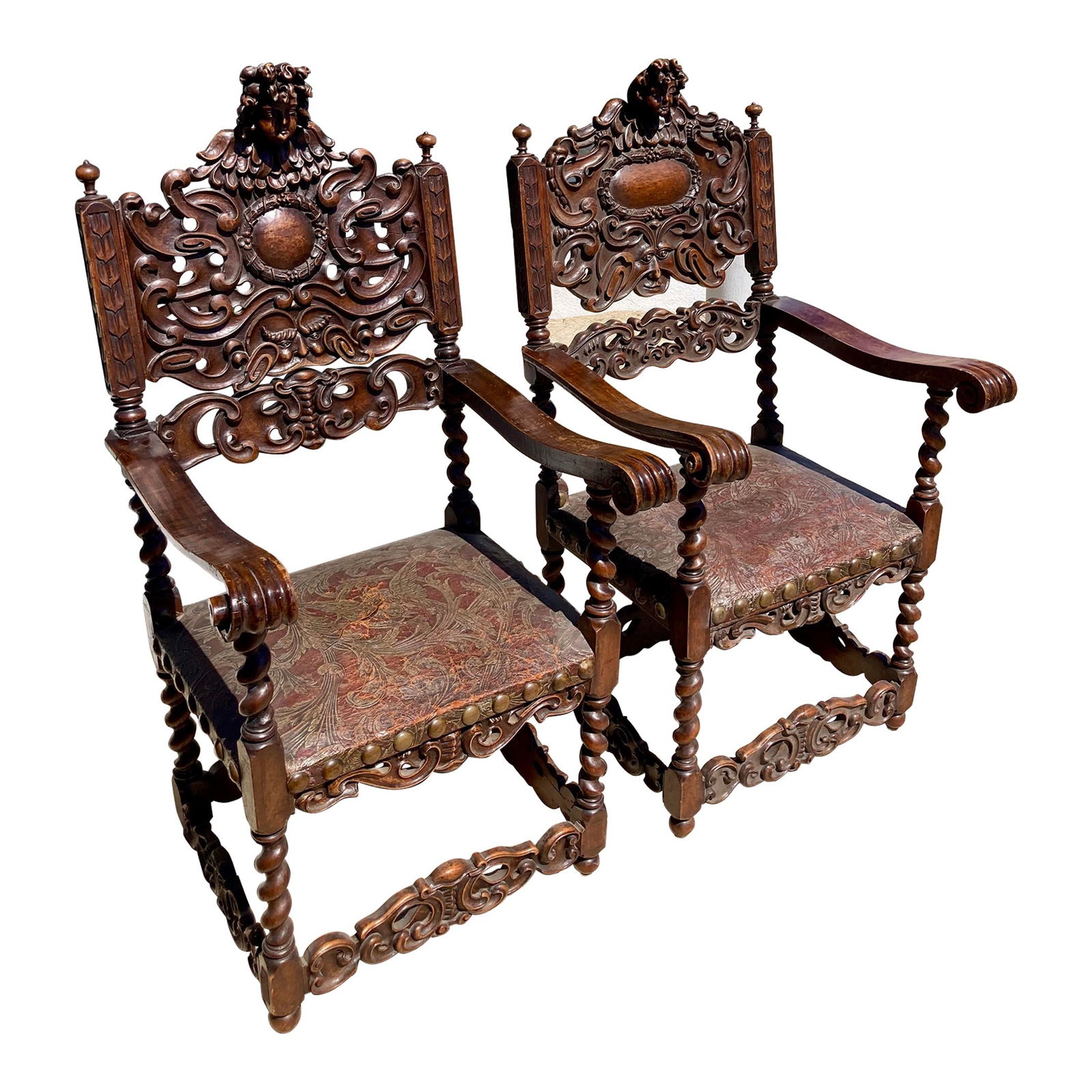 French Renaissance Carved Arm Chairs With Original Leather, a Pair - No Reserve: 26"W × 24"D × 49"H Arm height: 29.0 in Seat interior width: 19.0 in Seat interior depth: 17.0 in Seat height: 19.0 in 16th Century French Renaissance carvedaArm chairs with original leather seats. T